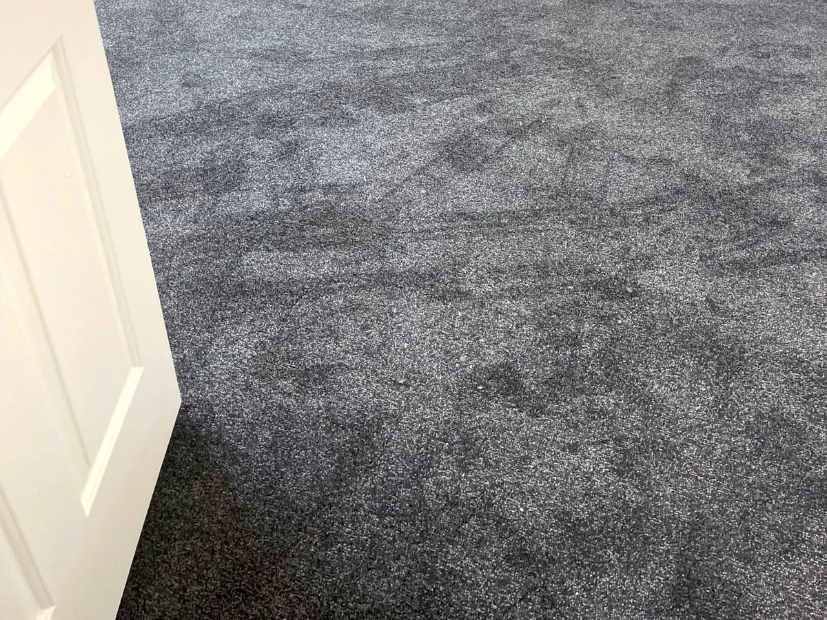 Grey loop pile carpet fitted in Newcastle hallway by Foxglove Flooring