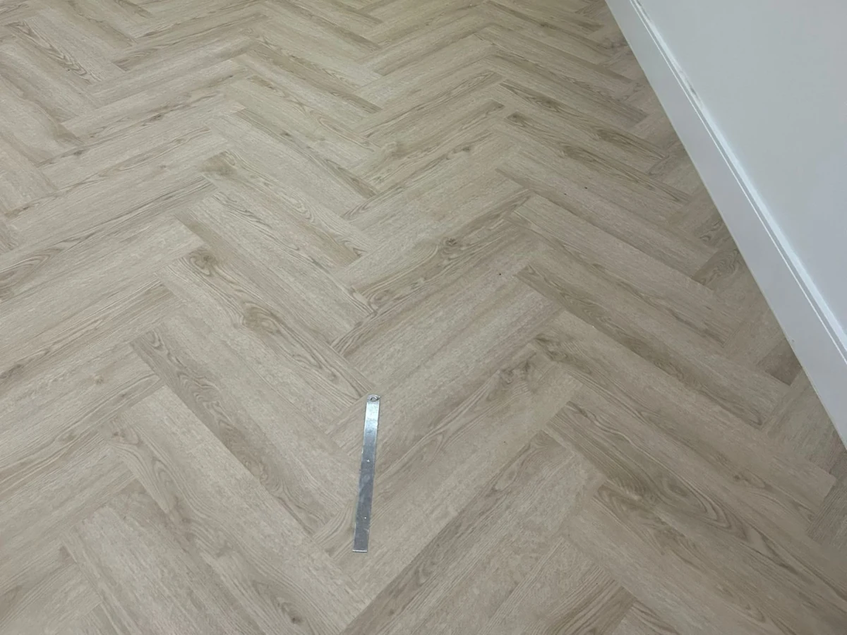 laminate-flooring-herringbone-close-up-newcastle-foxglove-flooring Light oak herringbone laminate — plank detail
